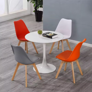"Eames dining set 4 seater wooden table and chairs Kenya" "Modern Eames style dining table with colorful chairs Nairobi" "Contemporary Eames dining furniture for home or office Kenya" "Stylish 4–6 seater Eames dining set multicolor chairs" "Durable modern Eames dining table with molded chairs Kenya"