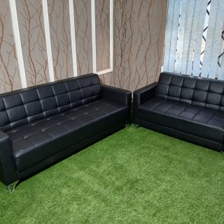 Large executive office sofa with premium cushioning for waiting area