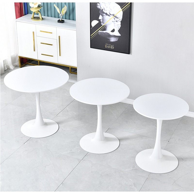 Modern Eames dining table with a minimalist design for stylish dining and contemporary spaces in Nairobi, Kenya.