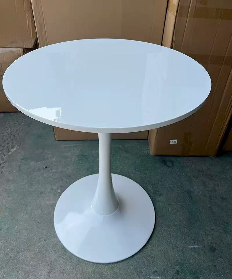 Modern Eames dining table with a minimalist design for stylish dining and contemporary spaces in Nairobi, Kenya.